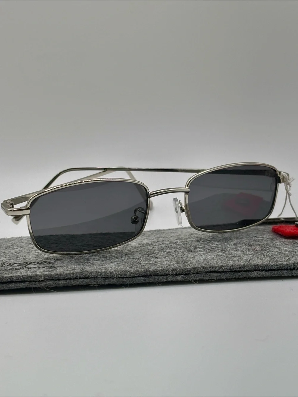 Vintage 90s Y2K Slim Rectangular Silver Metal Frame Sunglasses Dark Gray Lens